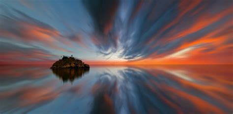 Island Sunset By Johannes Plenio