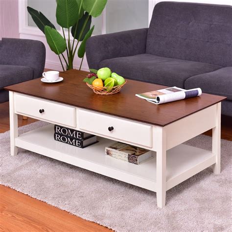 The table features a smooth, rectangular table top, with three open storage this coffee table features a marble table top, making it the perfect piece for your living room. Rectangle Wood Coffee Table with Drawer & Storage Shelf ...