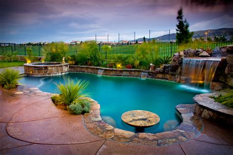 Creating a beautiful backyard oasis at home is the perfect solution. Create a Serene Backyard Oasis | Alan Jackson Pools