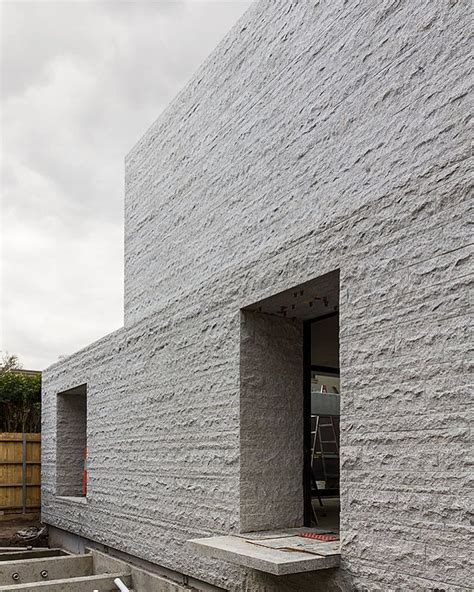 Rear Facade In Rough Granite At The Armadale Residence By B E