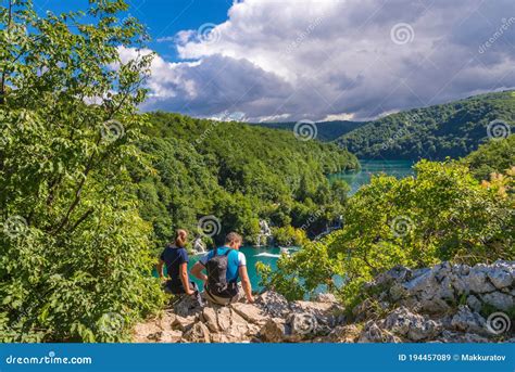 Boy And Girl Looking At The Plitvice Lakes Editorial Stock Image