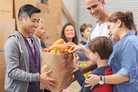 Based on your votes on twitter, and with the support of the youtube community, the la regional foodbank has received the funds to acquire and distribute 10,0. Multiethnic Group Of Volunteers Work At Food Bank Stock ...