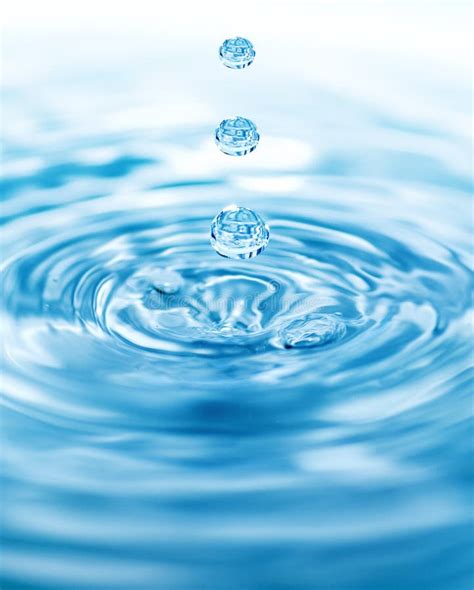 Droplet Falling In Blue Water Stock Photo Image Of Circle Macro 9577910