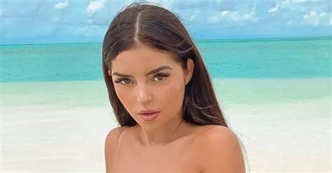 demi rose busts out of silk bathrobe and bats her bedroom eyes in revealing selfie