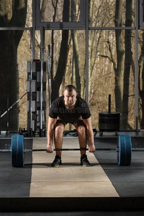 Deadlift Attempt Young Man Trying To Lift Heavy Barbell Stock Photo