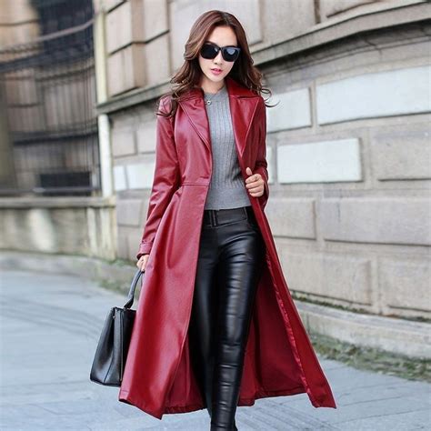 Asian Girl In Red Leather Trench Coat And Black Leather Pants Leather