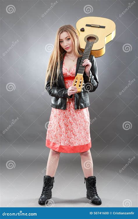 A Beautiful Young Blonde With A Classical Guitar Stock Photo Image Of