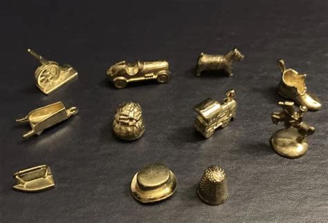 Monopoly Deluxe Set Of 11 Gold Token Pawn Mover Game Replacement Pieces