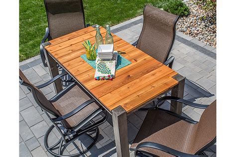 The table is perfect for those lazy summer afternoons at the cottage. Cedar Patio Table - buildsomething.com