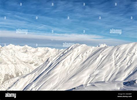 Scenic Austrian Alpine Mountain Peaks Covered With Snow Layer In Winter