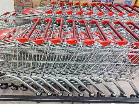 Shopping Trolleys Are Neatly Arranged In A Supermarket Editorial Stock