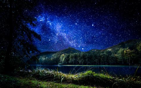 Starry Sky Over Mountain And Lake