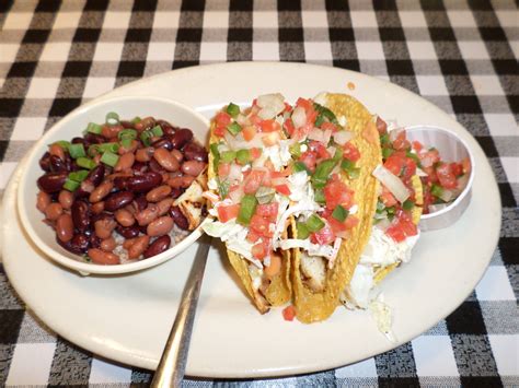 I added the the magic green sauce. Best Fish Tacos in Bentonville - NWA Food