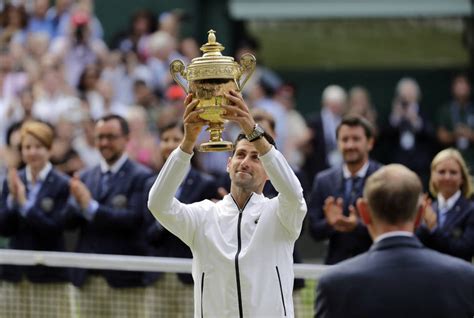 There are two copies of the trophy (with a replica of the original 1892 part and several additions). Djokovic edges Federer in 5 sets for 5th Wimbledon trophy ...
