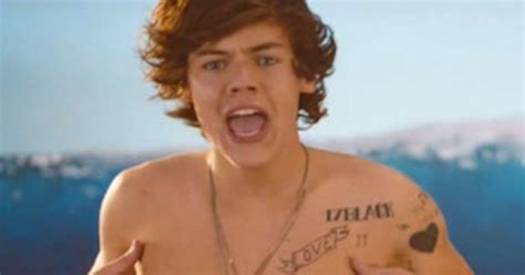 harry styles shows off bonus nipples in one direction s kiss video line up ladies e news