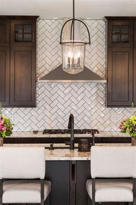 I think my favorite stain is the backsplash tile is almost always done after the upper and lower cabinets are in (it helps you to. 50+ White Herringbone Backsplash ( Tile in Style ...