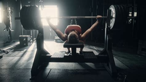 Portrait Of Strong Woman Lifting Weights Stock Footage SBV Storyblocks