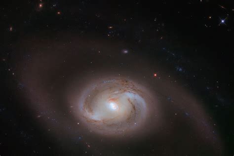 Hubble Sees A Galaxy With Spiral Arms Surrounded By Other Spiral Arms