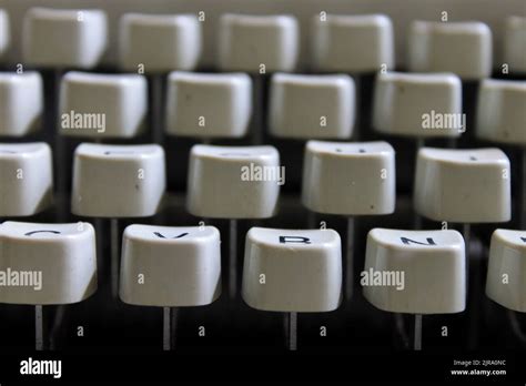 A Closeup Of A Grey Vintage Typewriters Keyboard Stock Photo Alamy