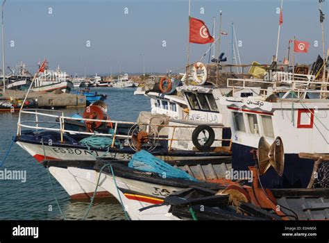 Tunisia Fishermen And Fishing Boats In The Port Of Tabarka Town Stock