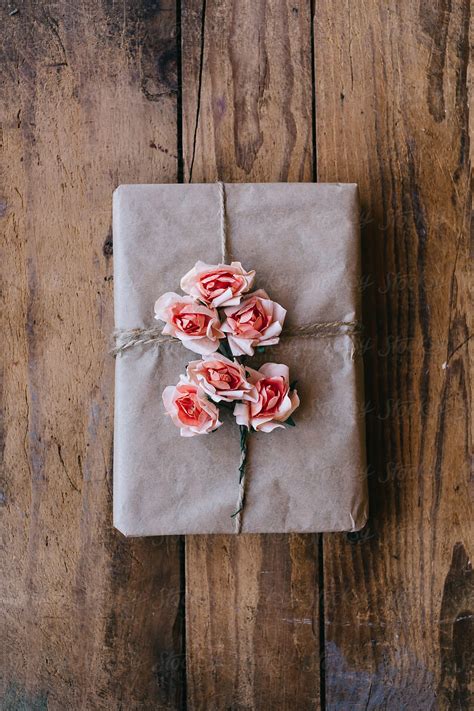 Brown Paper T Decorated With Pink Paper Flowers By Stocksy