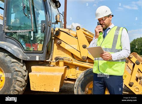 Construction Supervisor Working on Site Stock Photo: 156212262 - Alamy