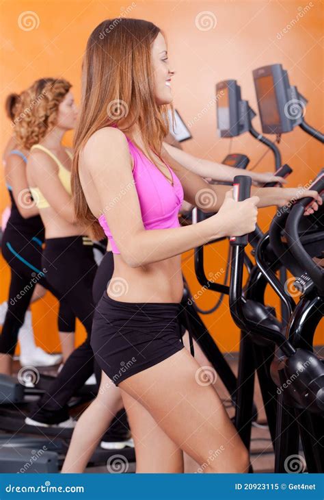 Group Of Four People In The Gym Stock Image Image Of Club Attractive 20923115