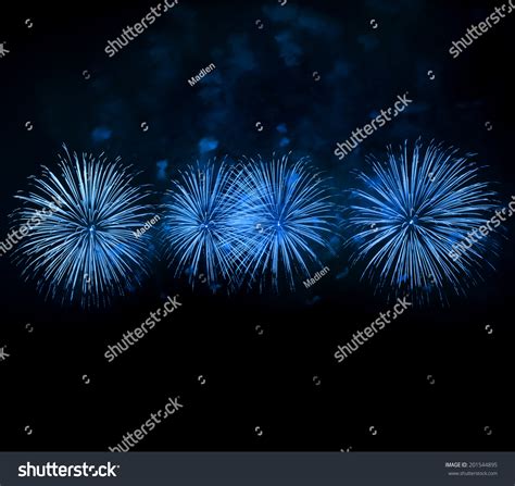 Blue Fireworks Over Night Sky Background Stock Photo 201544895
