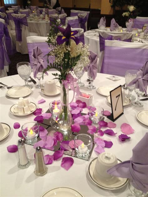 Happy first wednesday of 2012! Lilac purple color scheme with loose flower petals . wedding reception and event decor ideas ...