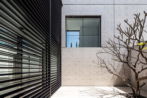 Concrete And Glass Surfaces Extend From Inside To Outside Of Israeli
