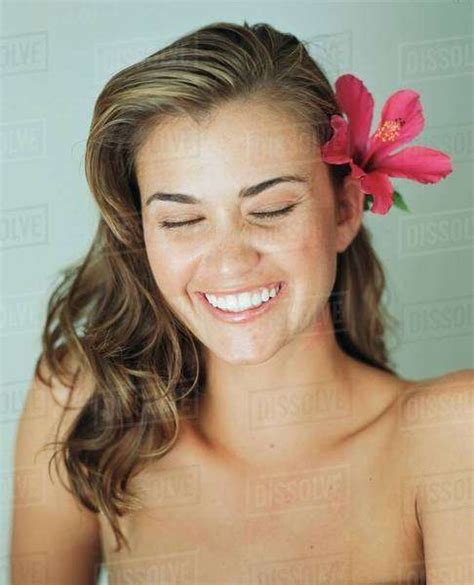 Nude Woman Wearing Flower In Hair Stock Photo Dissolve
