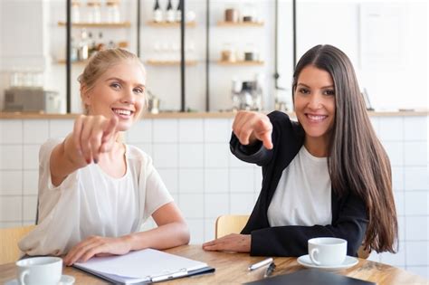 Free Photo Happy Young Business Women Giving High Five And