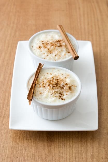 Premium Photo Arroz Con Leche Rice Pudding With Cinnamon On Wood