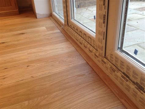 That being said, i would also advise removing the tile first. Salisbury Wood Floors Ltd - Wood Flooring Specialist ...
