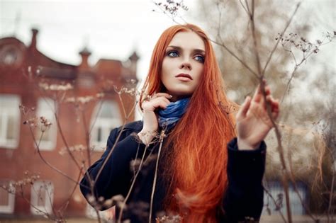 Premium Photo Woman Long Red Hair Walks In Autumn On The Street