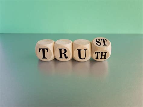 Premium Photo Truth Or Trust Symbol Turned Wooden Cubes And Changes