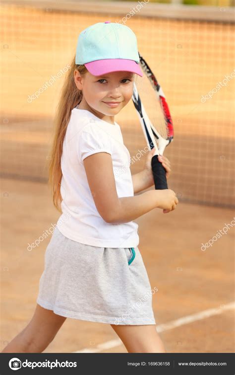 Cute Little Girl Playing Tennis Court Stock Photo By ©belchonock 169636158