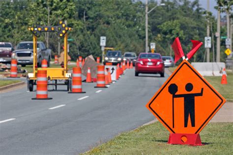 Flagman Ahead Sign Stock Photos Pictures And Royalty Free Images Istock