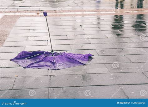 Broken Umbrella On Wet Sidewalk Stock Image Image Of Parasol Colors