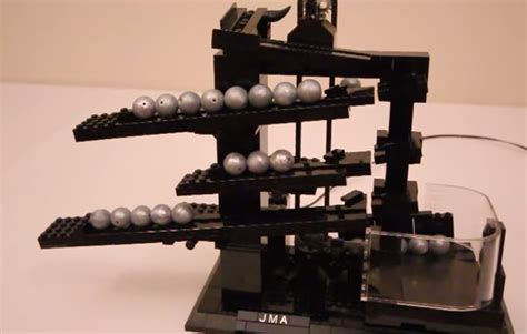 Man Builds Custom Designed Lego And Balls Clock Video Boomsbeat