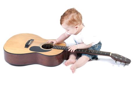 Child Plays With A Guitar Stock Photo Image Of Concert 30494236