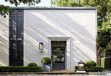 White Brick Black Shutters The Perfect Combination For A Timeless Home