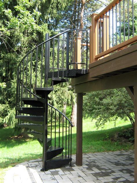 Aluminum Powder Coated Spiral Stair To An Under Deck Patio Patio