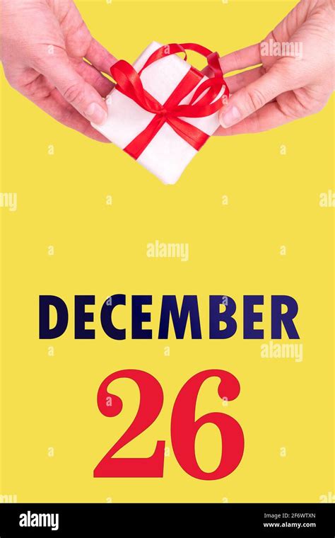 December 26th Festive Vertical Calendar With Hands Holding White T