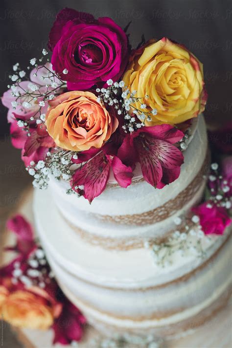 Wedding Cake Decorated With Fresh Flowers By Stocksy Contributor Ruth Black Stocksy
