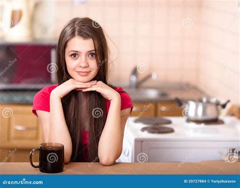Happy Teen Girl Drinking Coffee At Home Stock Photo Image Of Coffee
