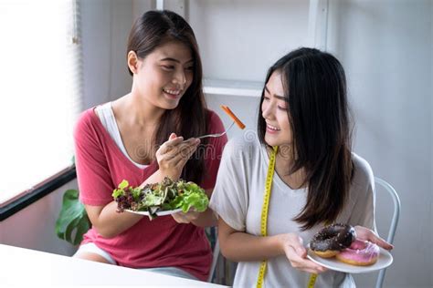 The Girl And Friends Are Happy To Eat Healthy Food Stock Photo Image