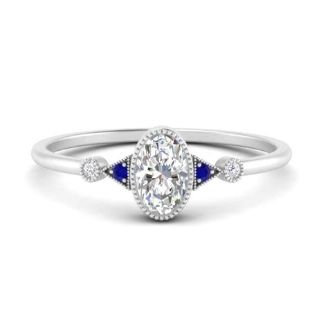 Bezel Set Oval Halo Vintage Engagement Ring With Sapphire In 14k White