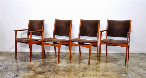 They have been reupholstered in. SELECT MODERN: Set of 4 Danish Modern Teak Dining Chairs
