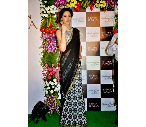 Bollywood Style Nargis Fakhri Georgette Saree In Black And White Color